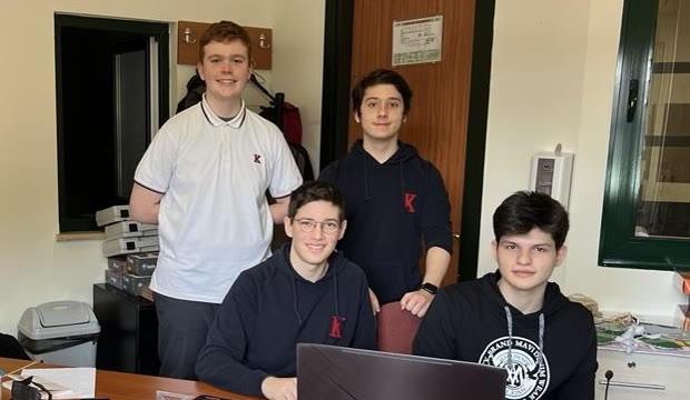GÖK-TÜRK high-school teammates gathered around laptops during our UAV project.